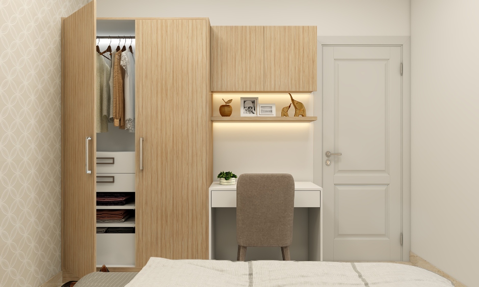 1 bhk interior wardrobe designed with multiple compartments, hangers and drawers enable clutter-free arrangement
