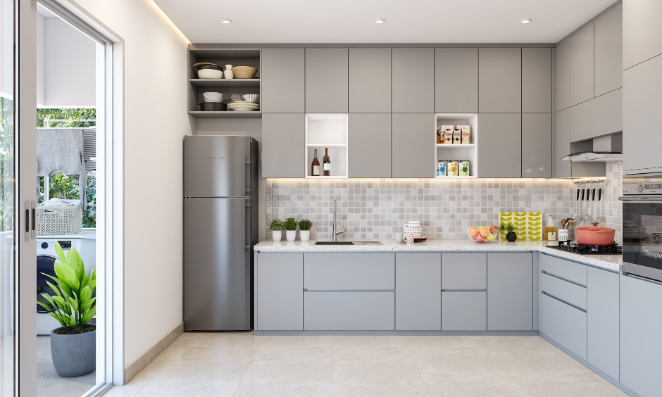 1 bhk kitchen design with handleless cabinets, open shelves, in-built hob and chimney adds a modern look