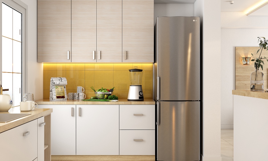 2bhk house kitchen has yellow tiled backsplash with led strip lighting breaks the monotony of muted colours