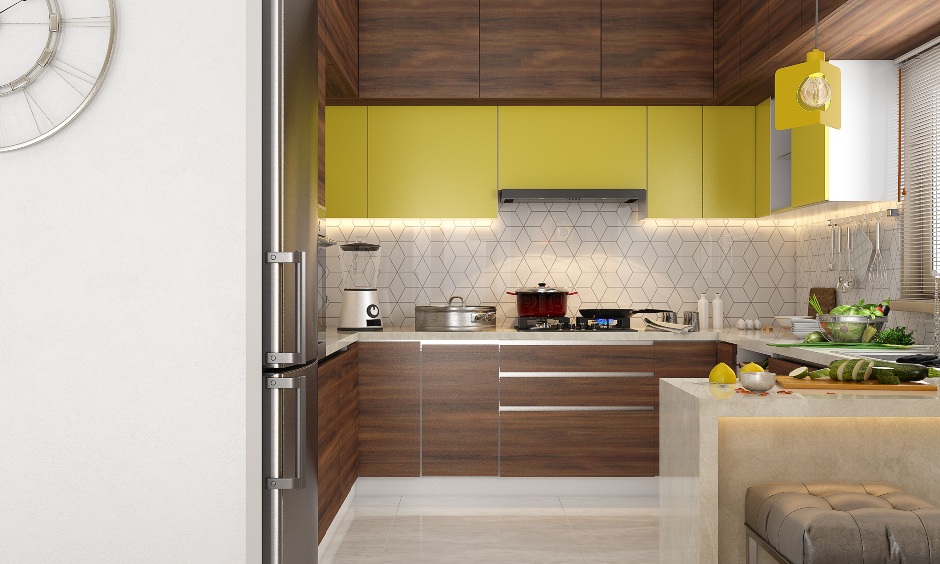 2bhk interior with g shaped modular kitchen with overhead and base cabinets finished in yellow and wood laminate