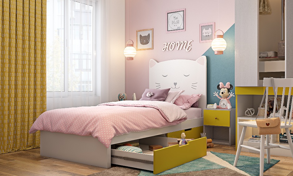 2bhk interior with beautiful accent wall in pink built with storage in kids bedroom