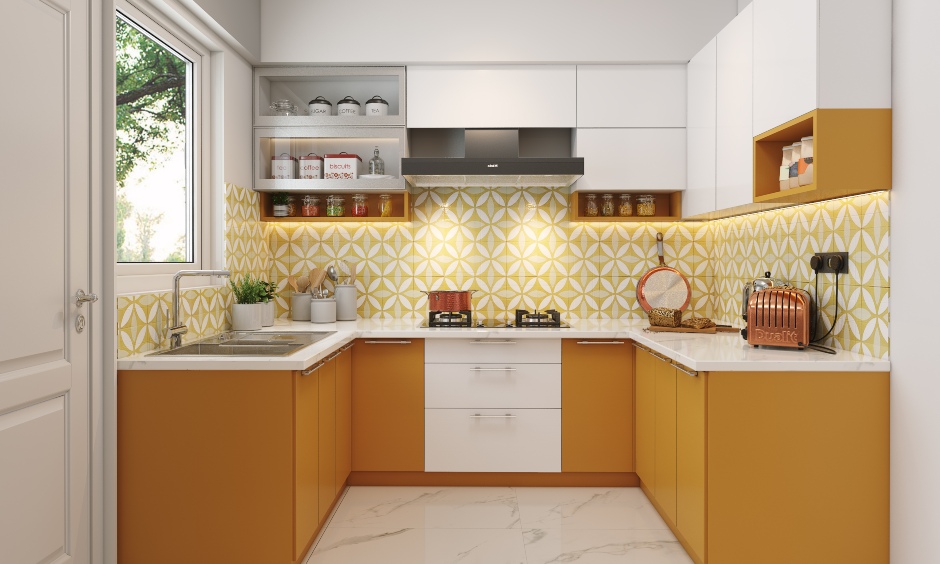 2bhk kitchen designed with pull-out units, drawers, cabinets and shelves for a clutter-free experience