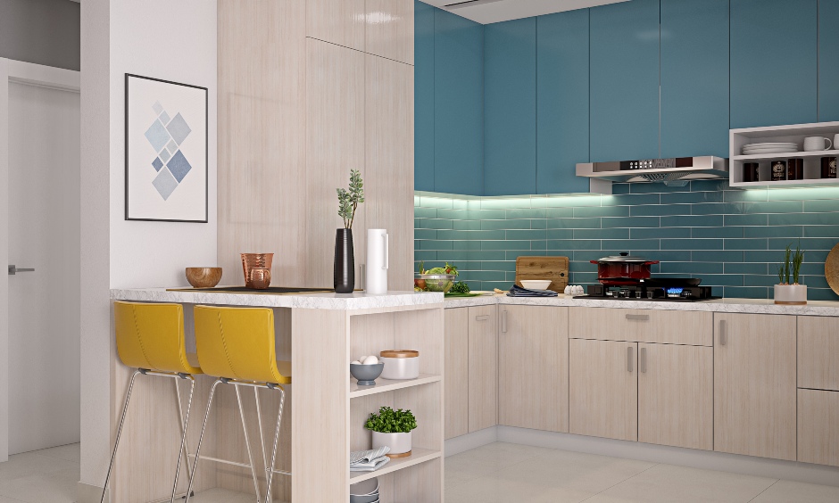 Blue and cream kitchen 3 bhk design home with breakfast counter and two tall chairs