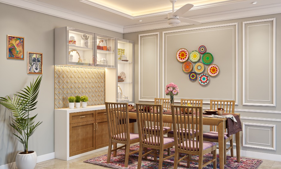 3 bhk home dining room with the built-in-crockery unit and solid wood dining table lends a classic look