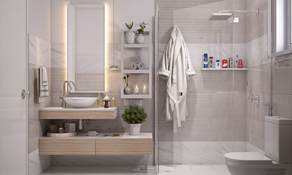 3bhk designed bathroom with glass partition and wall-mounted vanity adds to the bathroom aesthetic