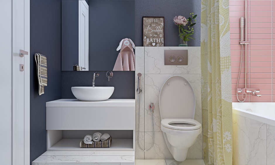 3 bhk home bathroom in grey, white and pink combination