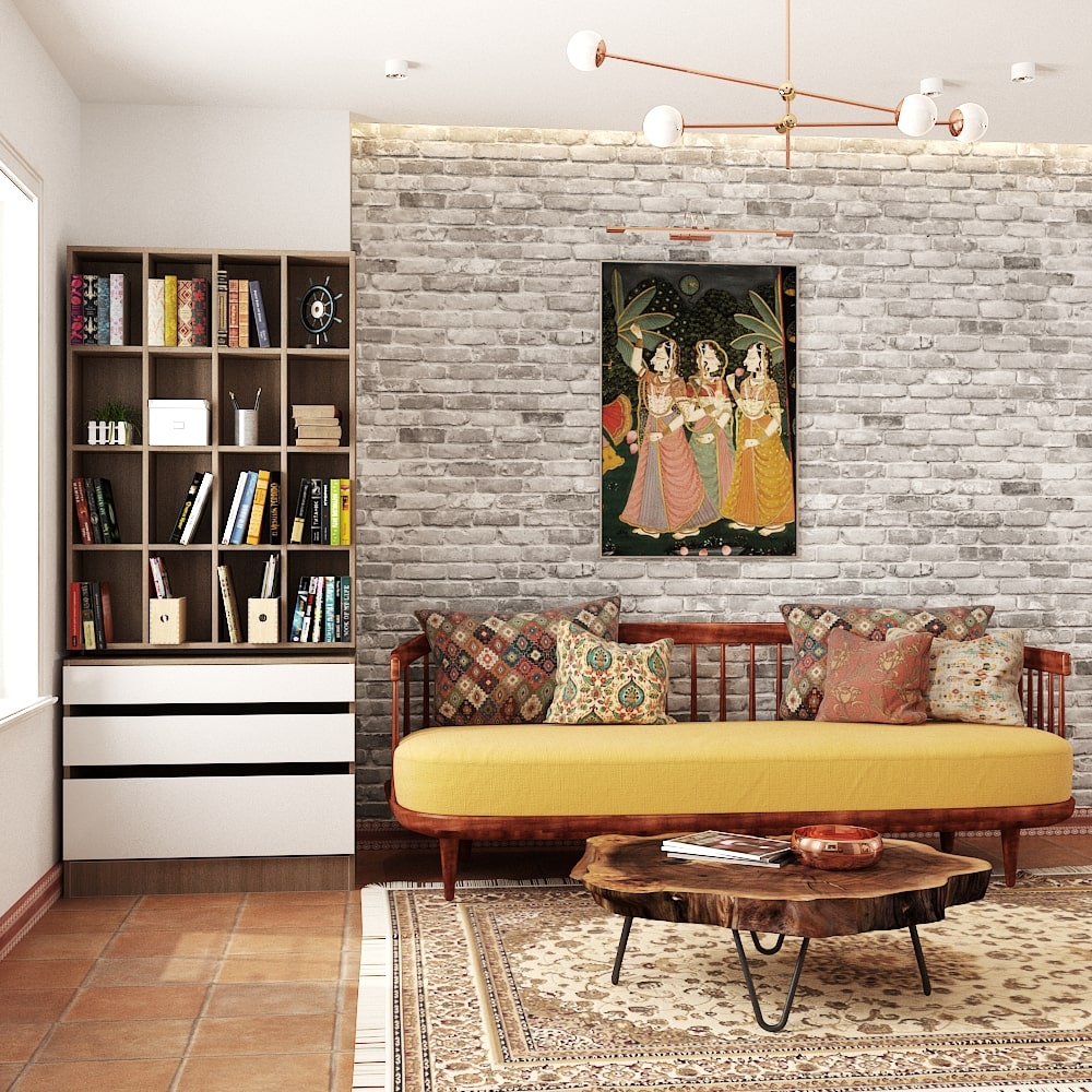 Affordable interior designers in Chennai have created a living room with a free-standing bookshelf