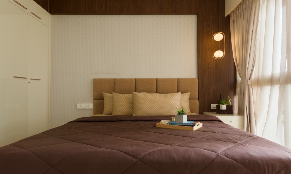 Bedroom comes with a beautiful beige colour scheme designed by interior design in mumbai