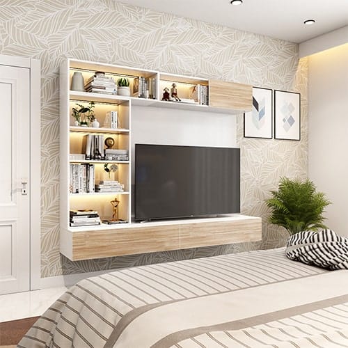 Bedroom designers in Ahmedabad designed a bedroom with a tv unit