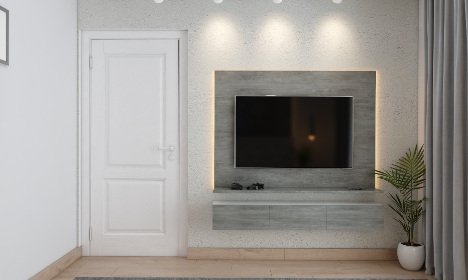 Bedroom tv unit designed in light grey finish with handleless drawers