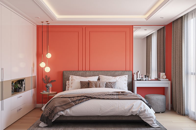 Bedroom wall color combinations with a bright shade of coral with white accents
