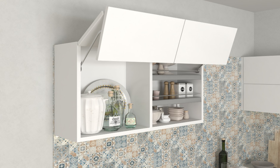 Bi fold lift up blue and white modular kitchen interior design for space saving in small kitchens in India