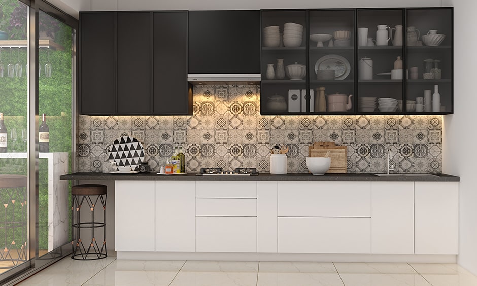 Black and white kitchen colour combination works well for a young couple