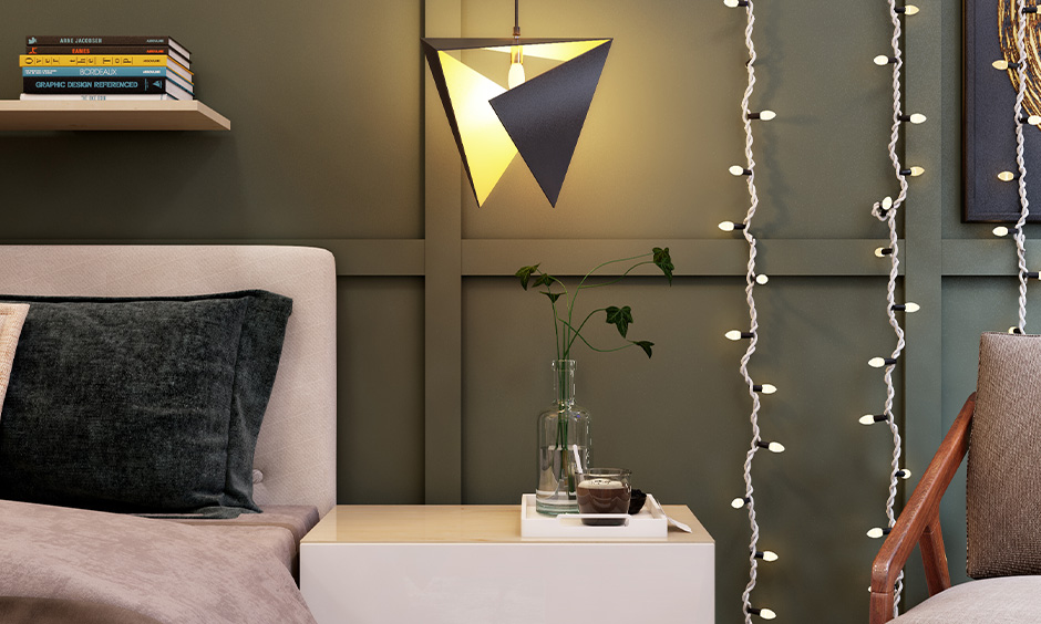 Decorative lights for bedroom with hung pendant lights on side table