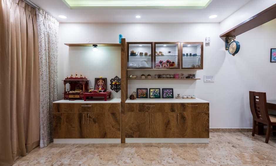 DesignCafe designed the crockery unit with a pooja area in suncity, Bellandur