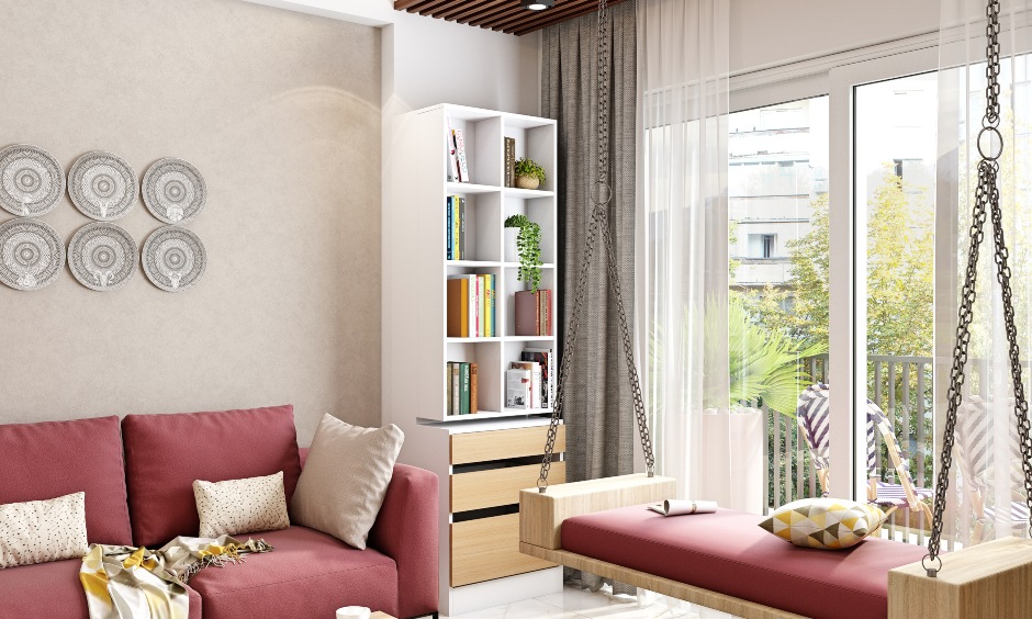 Eclectic living room interior with book cabinet and concealed storage