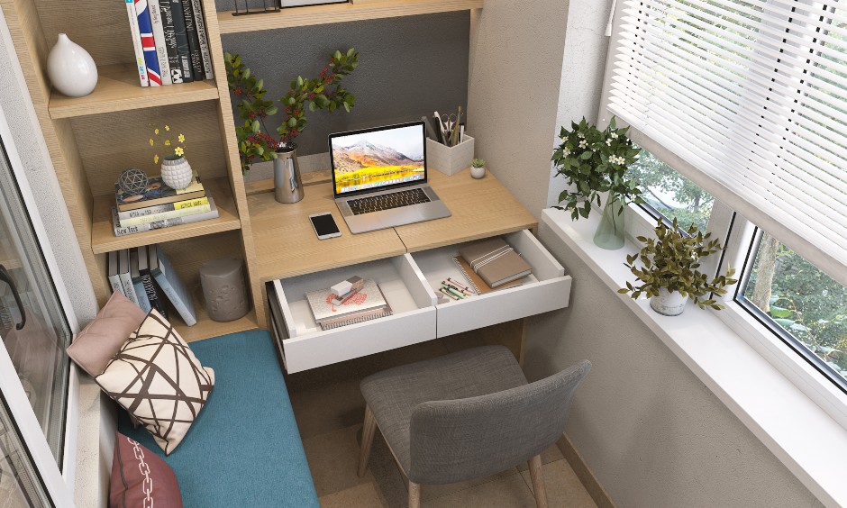 Home office arrangement in small balcony with a wooden open storage shelf