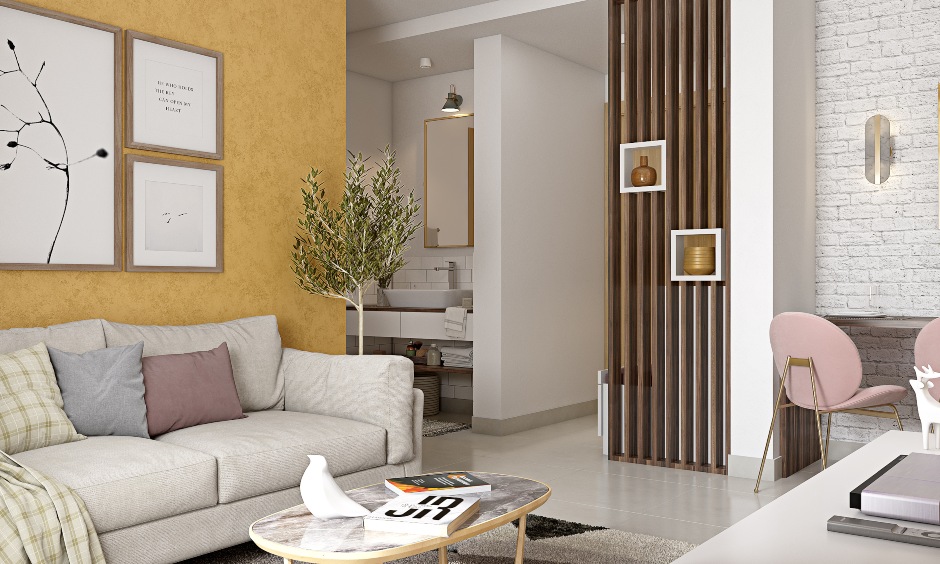 Elegant living room design with cosy sofa in 1bhk apartment design