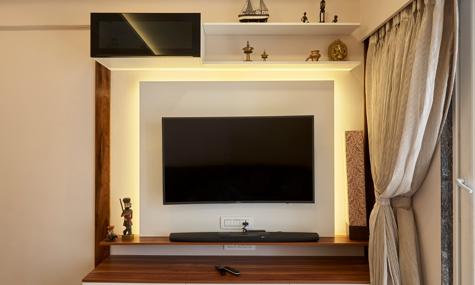 Floating corner TV unit is wall-mounted with backlights