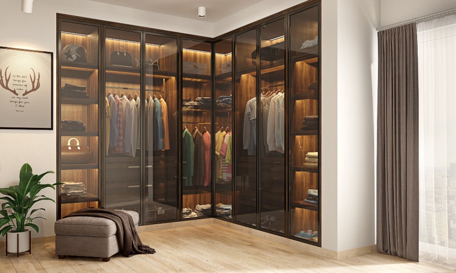 Floor to ceiling wardrobe design with glass shutters and wooden shelves