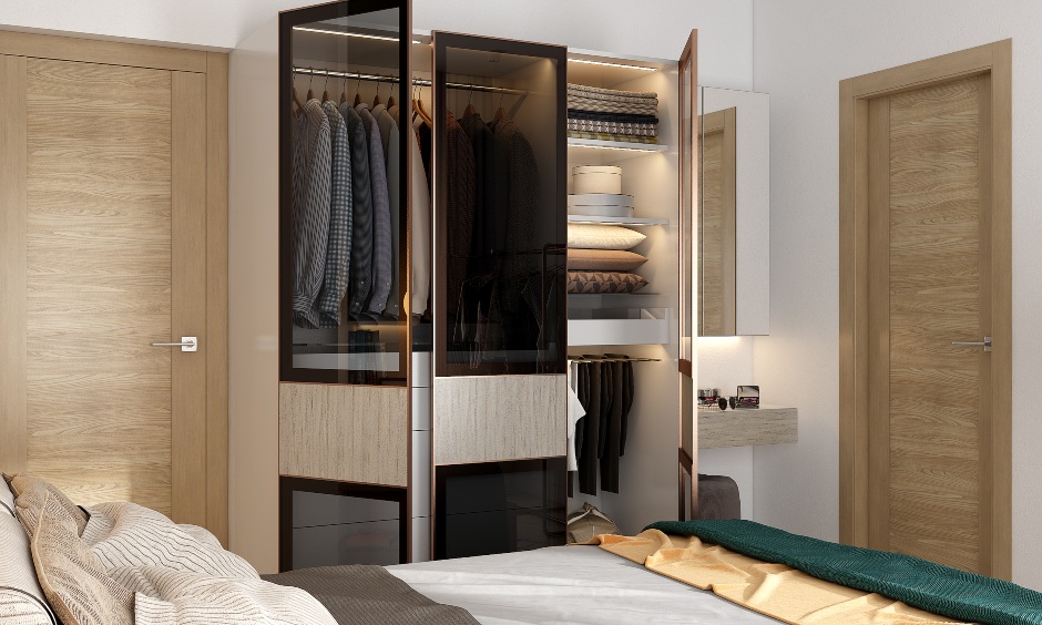Home interior design for 2bhk with wardrobe with tinted glass fronts adds an edge to the interiors