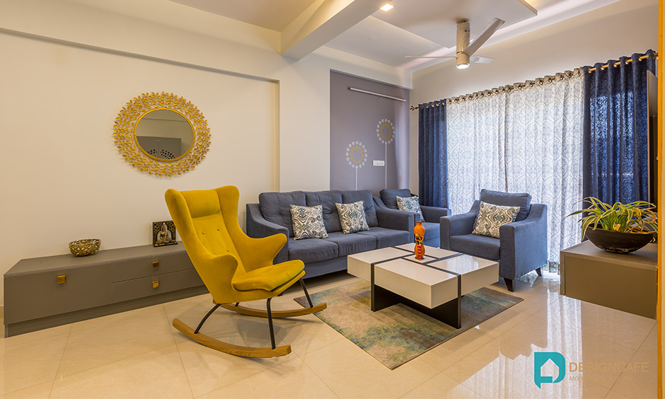 Interior consultants in bangalore for living room with l shaped sofa and swing chair