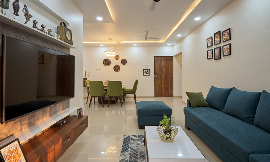 interior design in mumbai with living room, sofa, tv unit and dining table