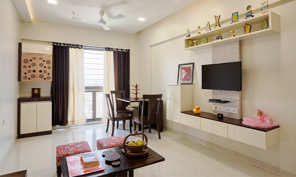interior design in mumbai with living room interior, storage and tv unit