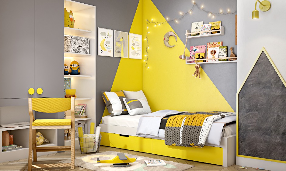 Kids bedroom design with wardrobe and attached study unit in grey color