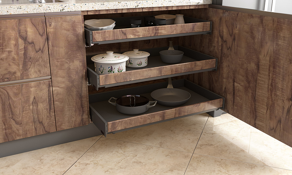 Wooden internal drawers base kitchen unit is capable with ample storage space to organise utensils look clean and elegant.