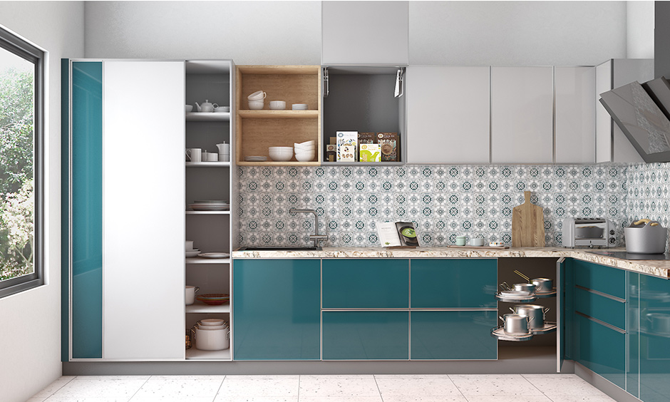 Blue & white laminate open boxes wall kitchen unit design is ideal for storing things that frequently used like spices & other essentials