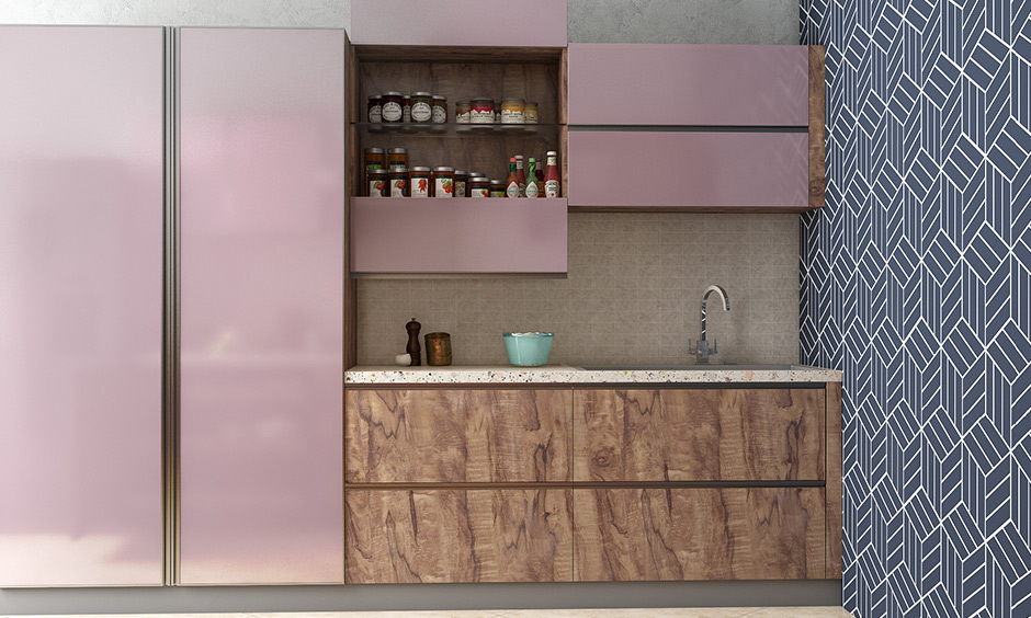 This pink bi-fold split shutter wall kitchen unit splits in the middle and opens vertically revealing deep storage