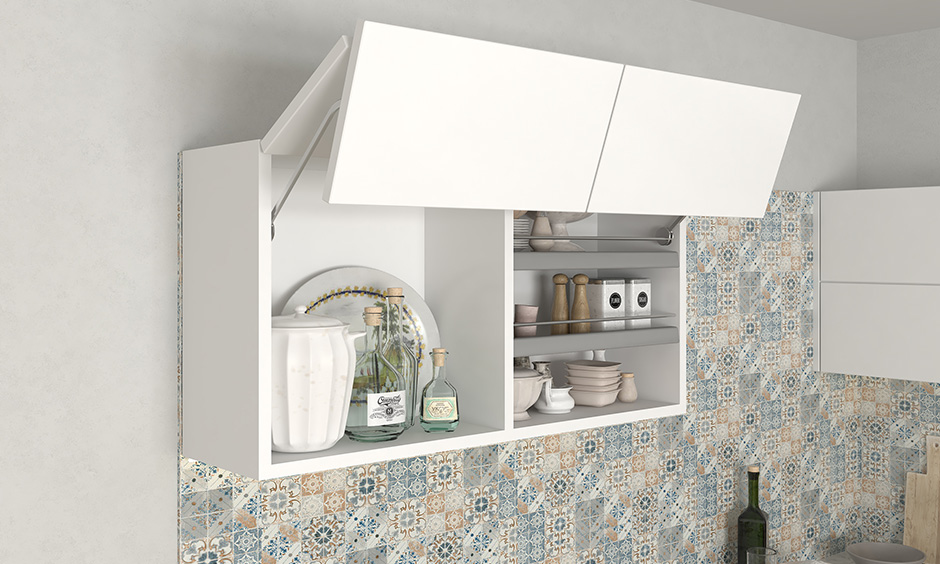 This white bifold lift-up shutter wall kitchen unit is a two-piece shutter that folds at the center and lifts up vertically.