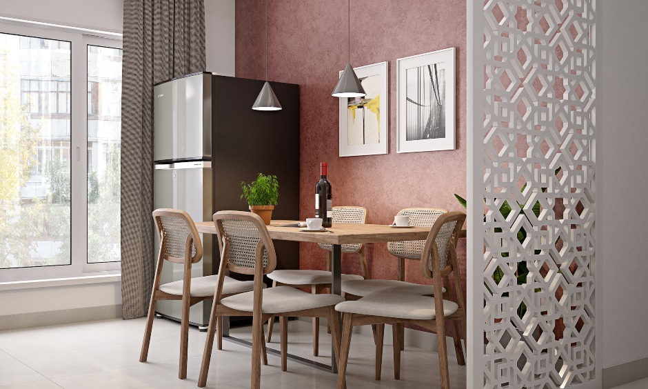Dining room with a five-seater dining table in 3bhk home brings a mid-century vibe