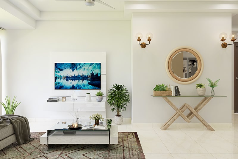 Living room wall decor that has hanging mirrors to amp up space and aesthetics of your living room.
