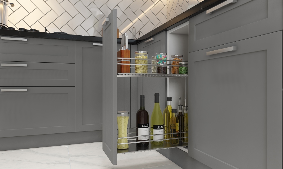 A modular kitchen design in l-shape with oil pull-outs provides ample storage for your utensils