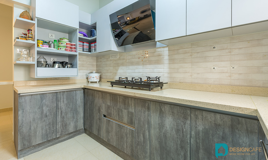 An l shaped kitchen designed by one of the best modular kitchen interior designers in bangalore