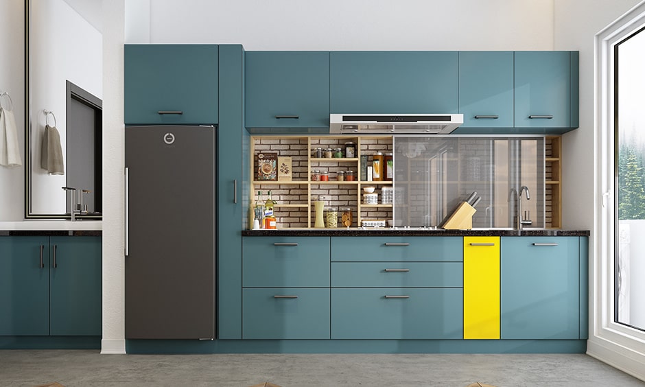 Modular kitchen with teal and yellow colour combination is a perfect balance between calmness and fun