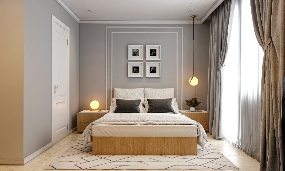Neoclassical bedroom design with wall moulding and pendant light on one side paired with a table lamp