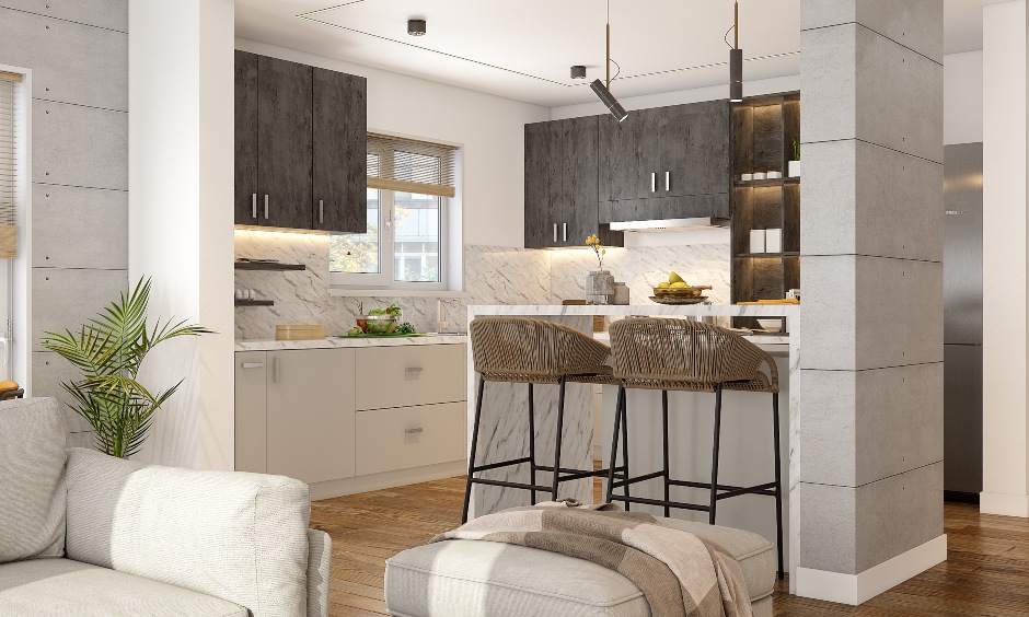 Open 1 bhk kitchen design with small breakfast counter with two tall chairs brings elegant look.