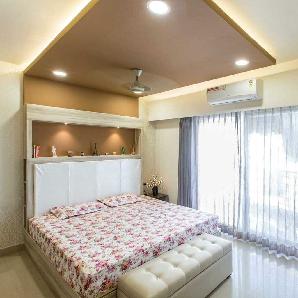 Panel false ceiling design for bedroom with swooping lines of the panel create a striking effect