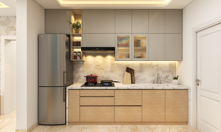 Small 1 bhk kitchen designed in dual tone with a white countertop and backsplash seamlessly blends with the design scheme