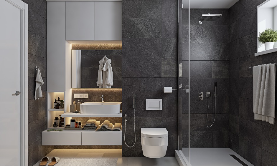 Small bathroom interior design with slate tiles and space saving vanity unit