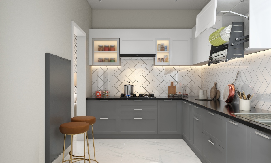 A small modular kitchen design in an l-shape layout is compact yet lends an elegant look