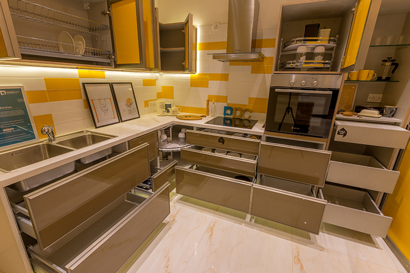 Optimum use of space with smart kitchen storage options while designing a modular kitchen.