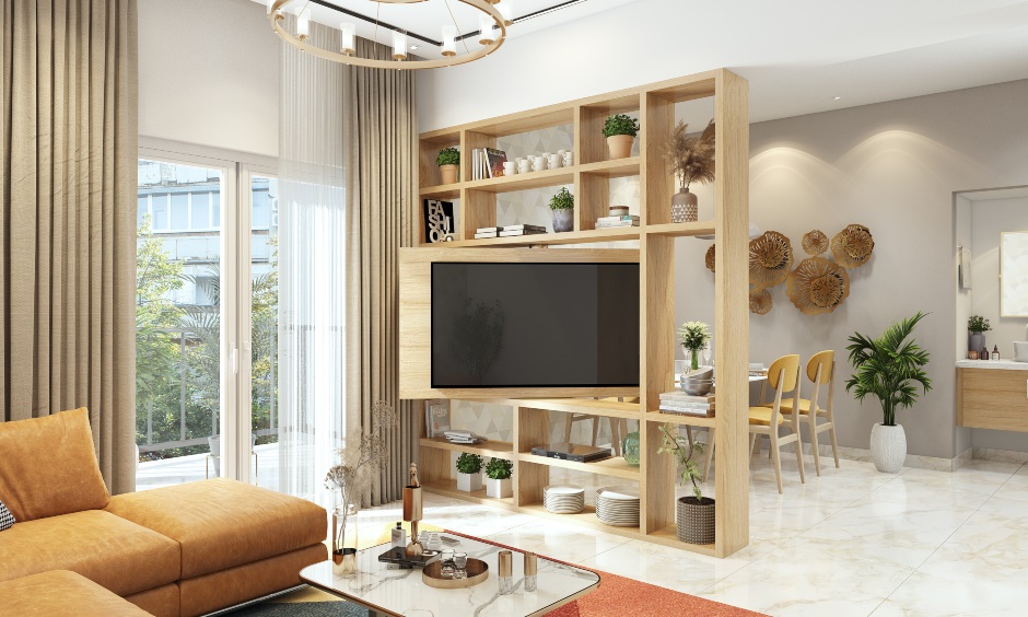 Space saving furniture with a swivel space-saving tv unit acts as a partition between the living cum dining room