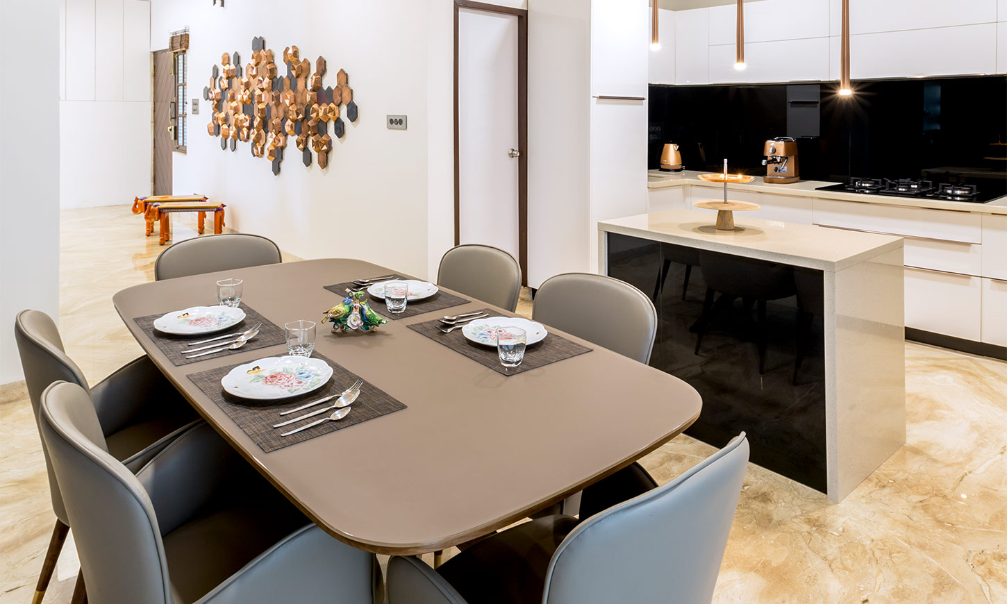 Grey dining table designed by top 10 interiors in bangalore