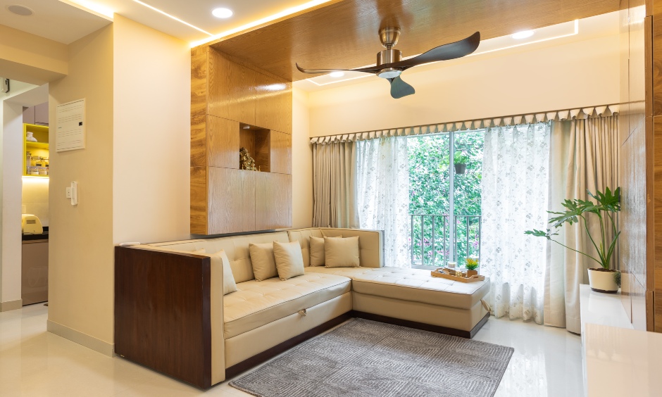 Top architects and interior designers in mumbai wheere living room has a sectional sofa, wooden wood panelling