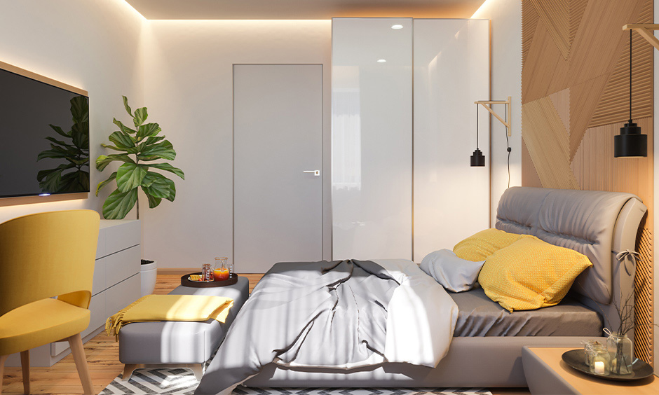 ambient lights are types of lighting in bedroom with wardrobe and tv