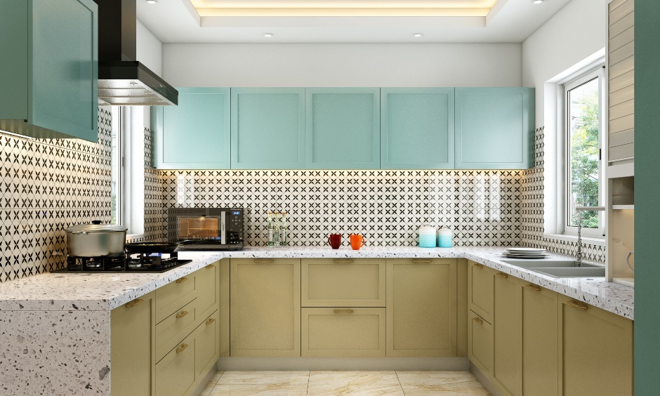 Modular kitchen in u shaped layout with pastel shades for Urban couples